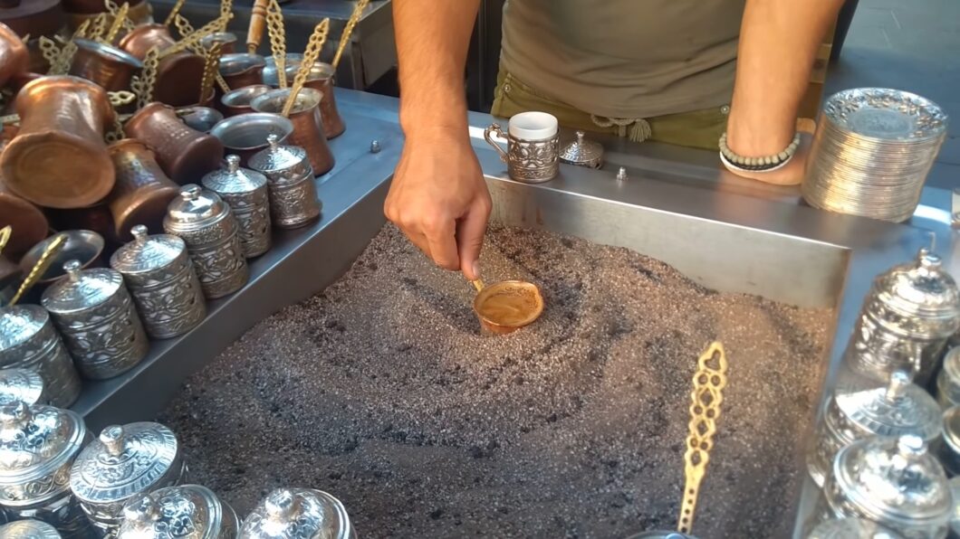 The real Turkish coffee cooked in the hot sand